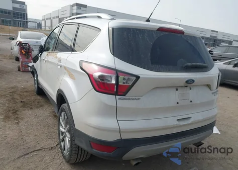 2017 Ford Escape Titanium z USA, uszkodzony, nr VIN 1FMCU9J96HUE25242